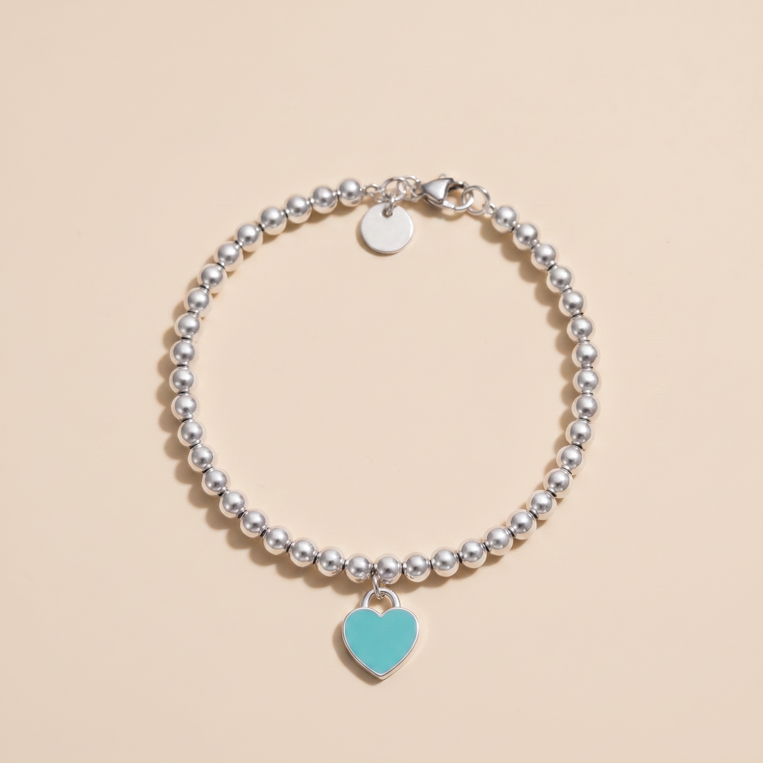 Return To T Heart Tag Bead Bracelet